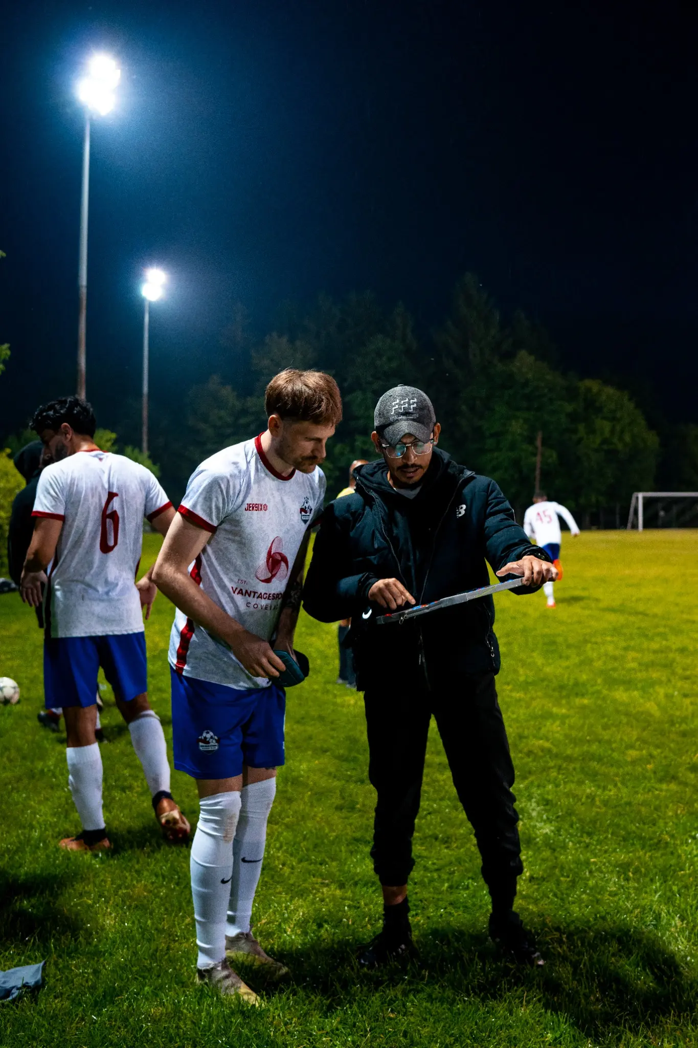 Coach reviewing play with an Inter Ottawa competitive player