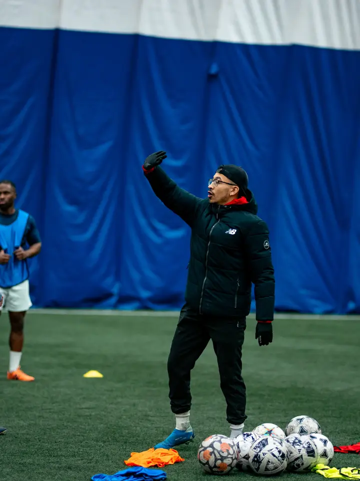 Coach leading an Inter Ottawa training session
