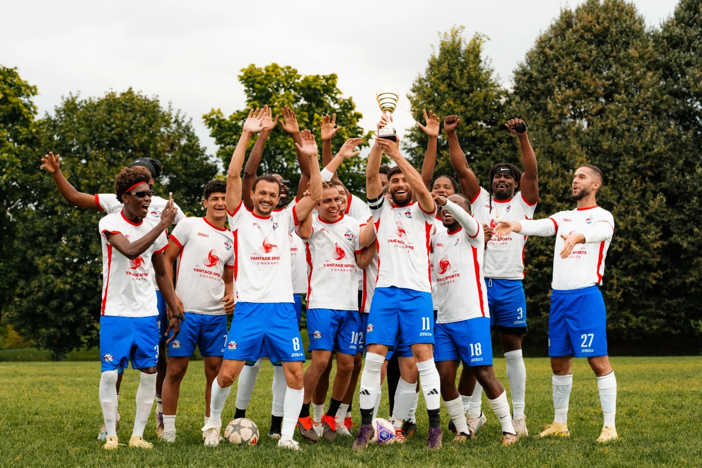 MC4 players celebrating their 2026 OCSL Men’s Competitive Division 4 championship
