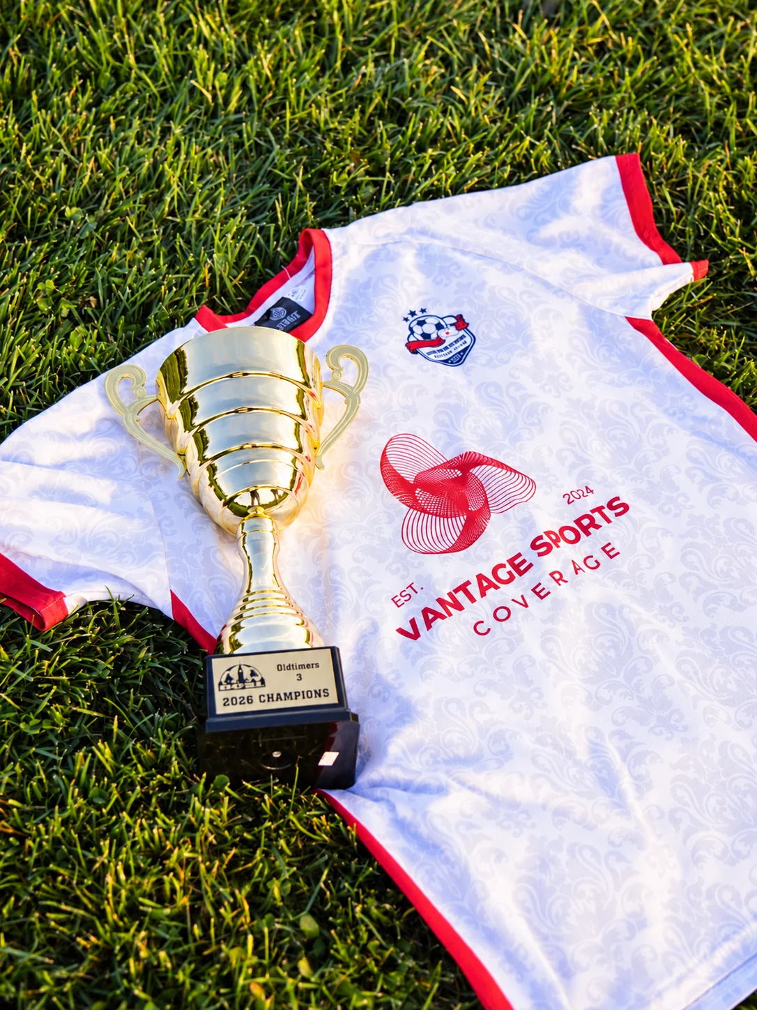 2026 OCSL Old Timers Division 3 champions trophy on the club jersey